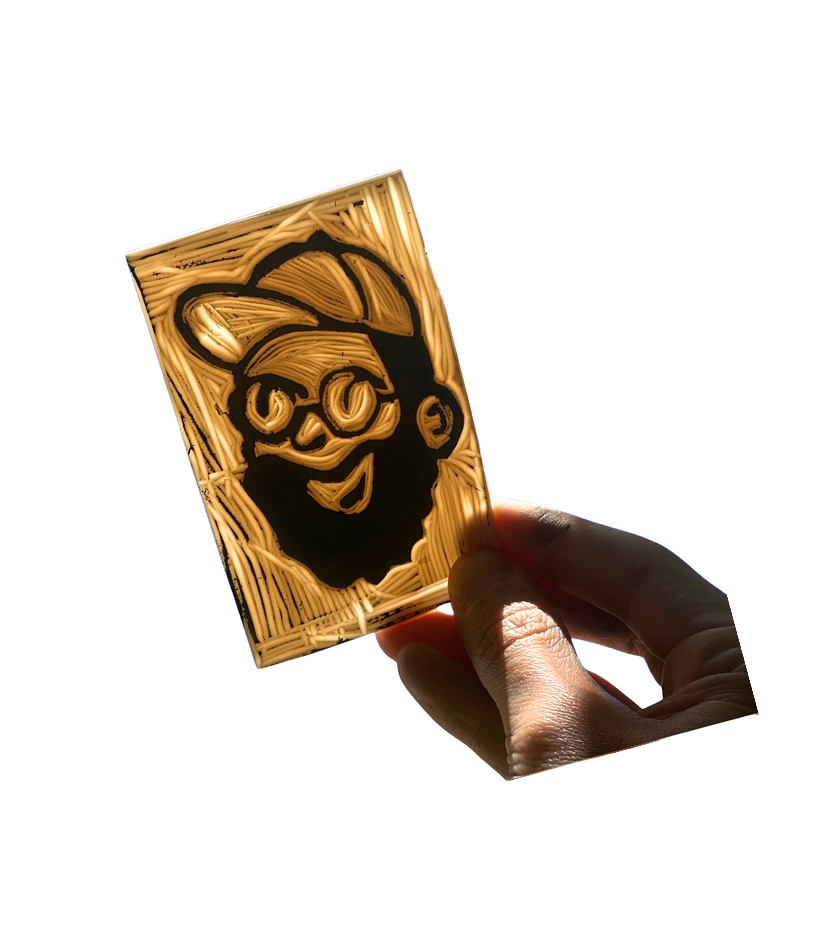 linogravure avec logo de Tonton Kraft tenu à la main